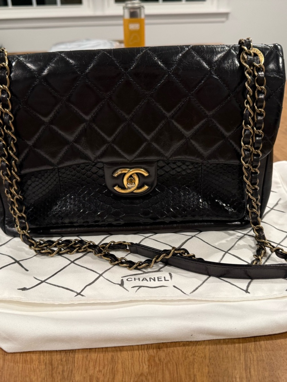 Chanel
Timeless/Classique python crossbody bag